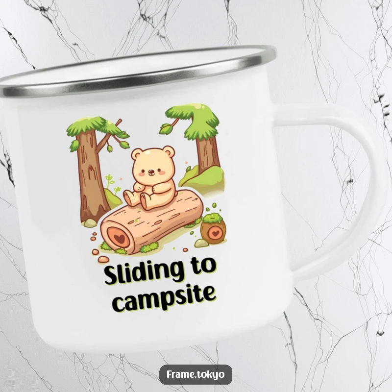 Funny bear camping mug with a happy bear sliding down a mossy log, ready for outdoor fun.