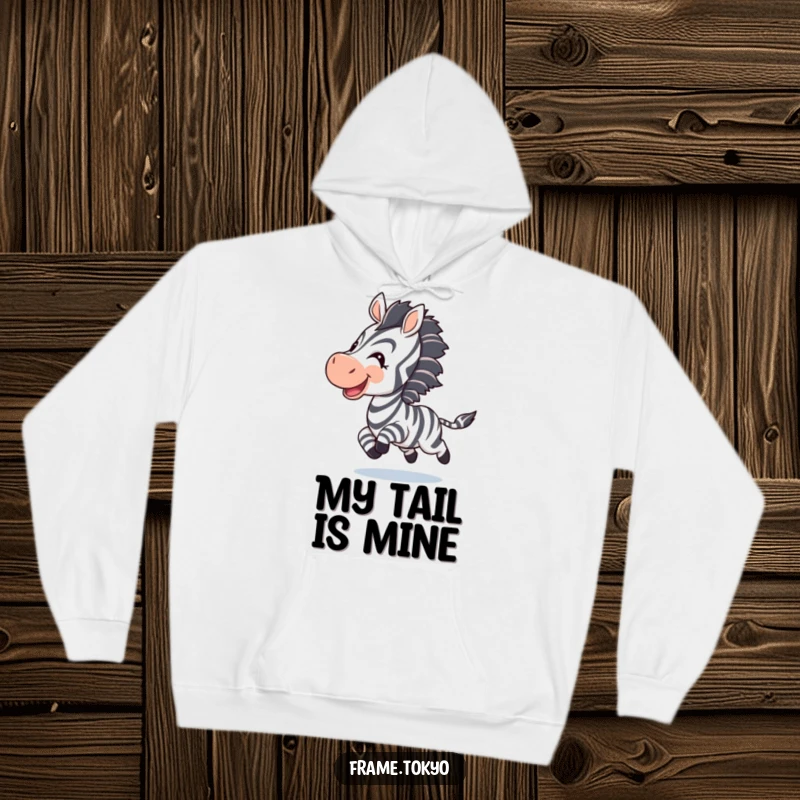 Funny zebra hoodie; a happy zebra chases its striped tail, radiating pure joy and playful energy.