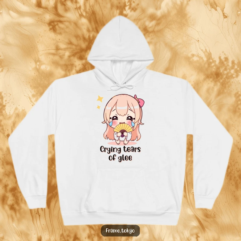 Funny hoodie with a character crying happy tears and holding a shimmering fan, offering cozy comfort and hilarious celebration vibes.