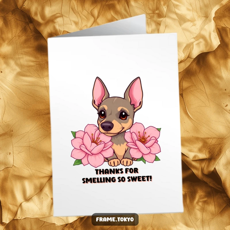 Funny Free Printable Pinscher Thank You Card: A Pinscher curiously sniffing large, beautiful flowers with its head tilted.