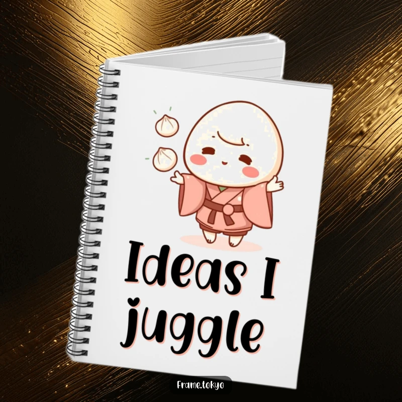 Funny mochi character wearing a kimono, juggling three small dumplings, inside a cute notebook for writing.