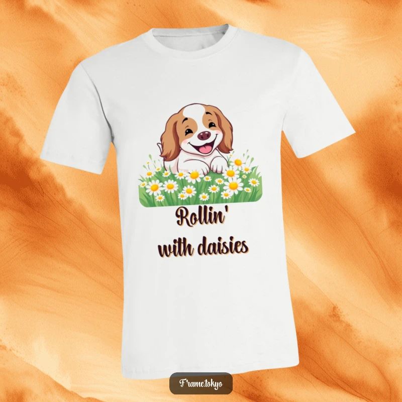 Funny Spaniel T-Shirt showing a spaniel with a huge smile rolling playfully in a sunny field full of white daisies.
