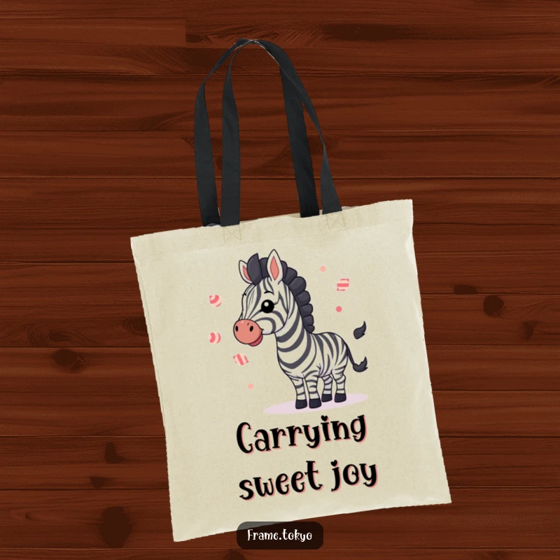 Funny zebra joyfully waving and juggling colorful striped candies, a charming and hilarious tote bag.